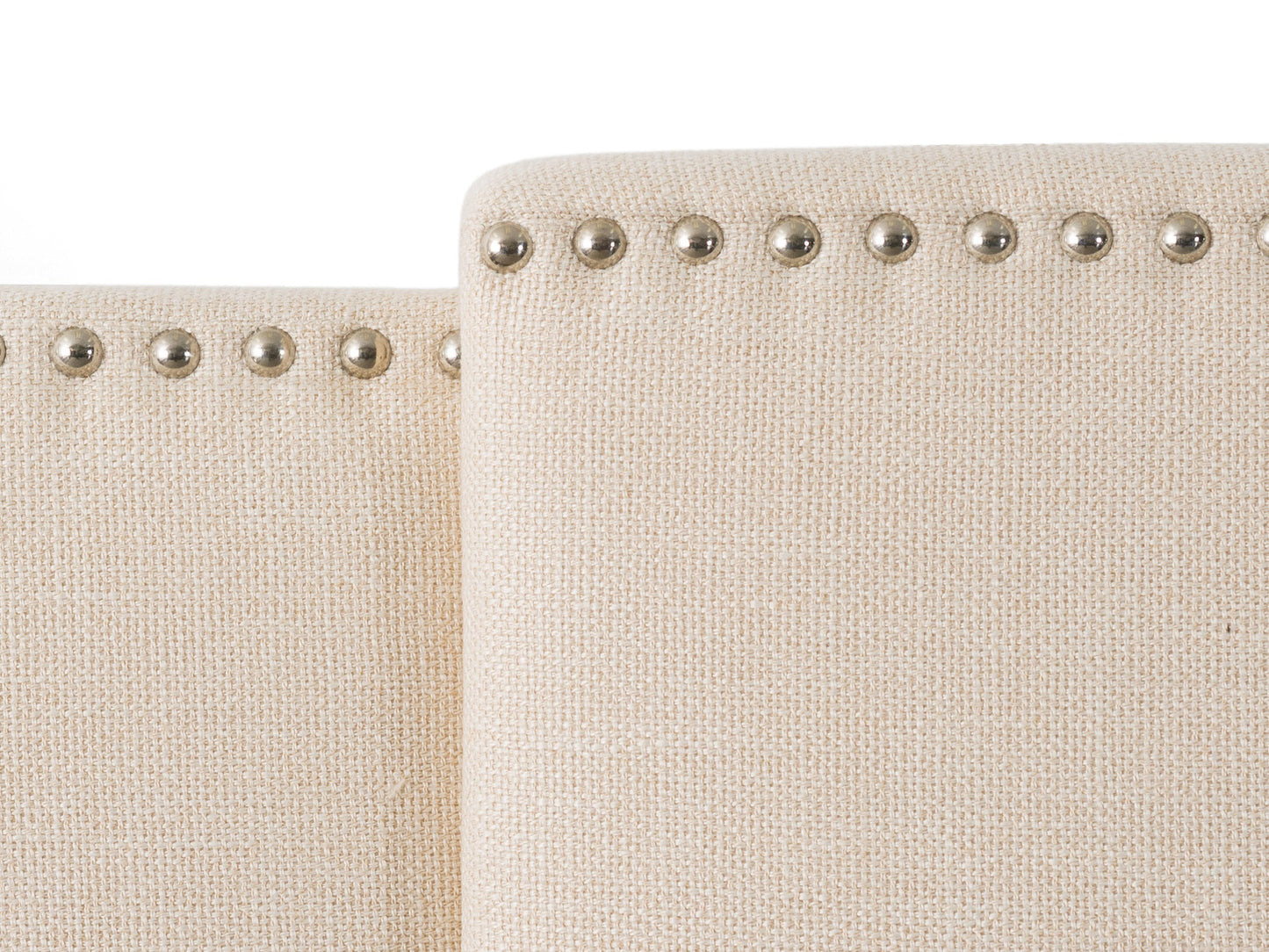 Cream adjustable headboard with tufted fabric, soft padding, and sleek design, compatible with various bed frames, ideal for modern or classic bedroom decor.