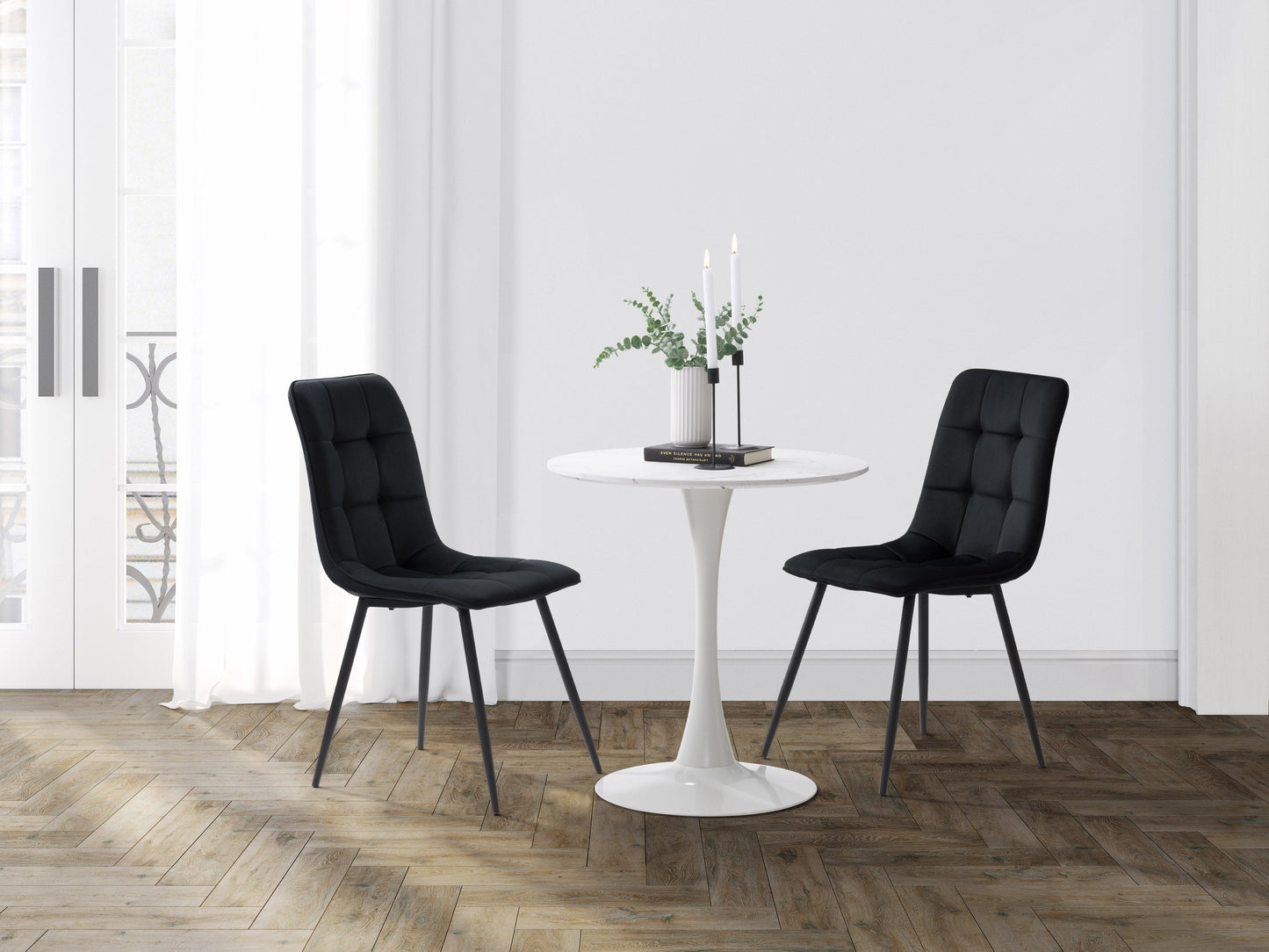 Black velvet upholstered dining chairs, set of 2, featuring sleek gold metal legs, plush cushioning, and a modern design perfect for contemporary dining rooms or elegant kitchen spaces.