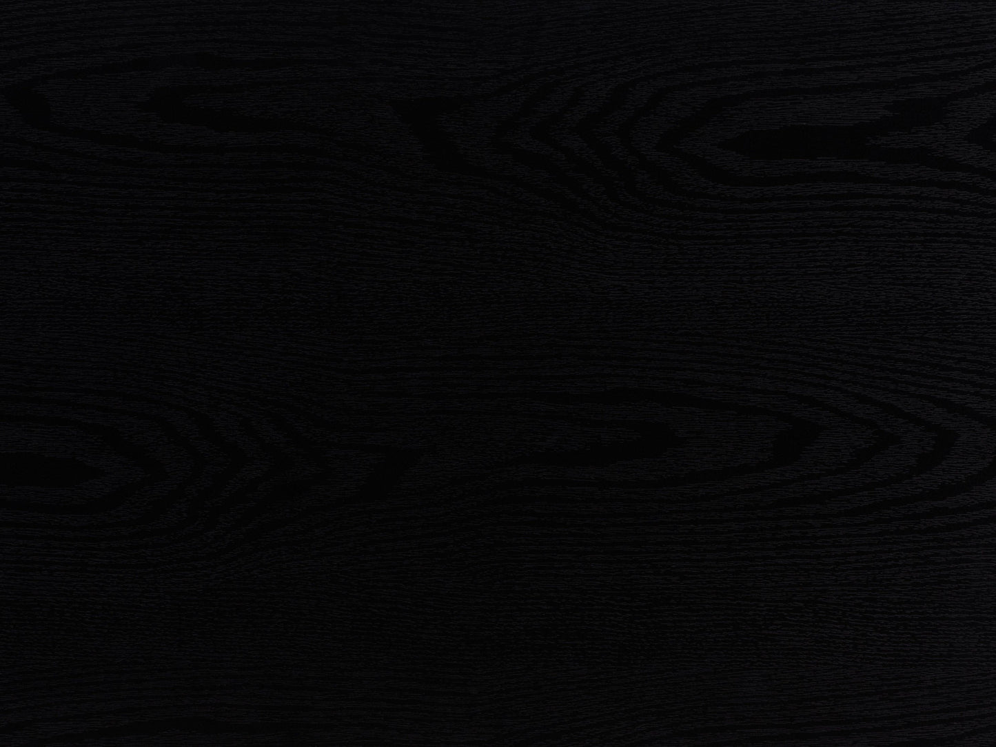 Black fluted side table with a round top, sleek black finish, and vertical grooves for a modern, elegant look. Made of durable wood, perfect for living rooms or bedrooms as a stylish accent piece.