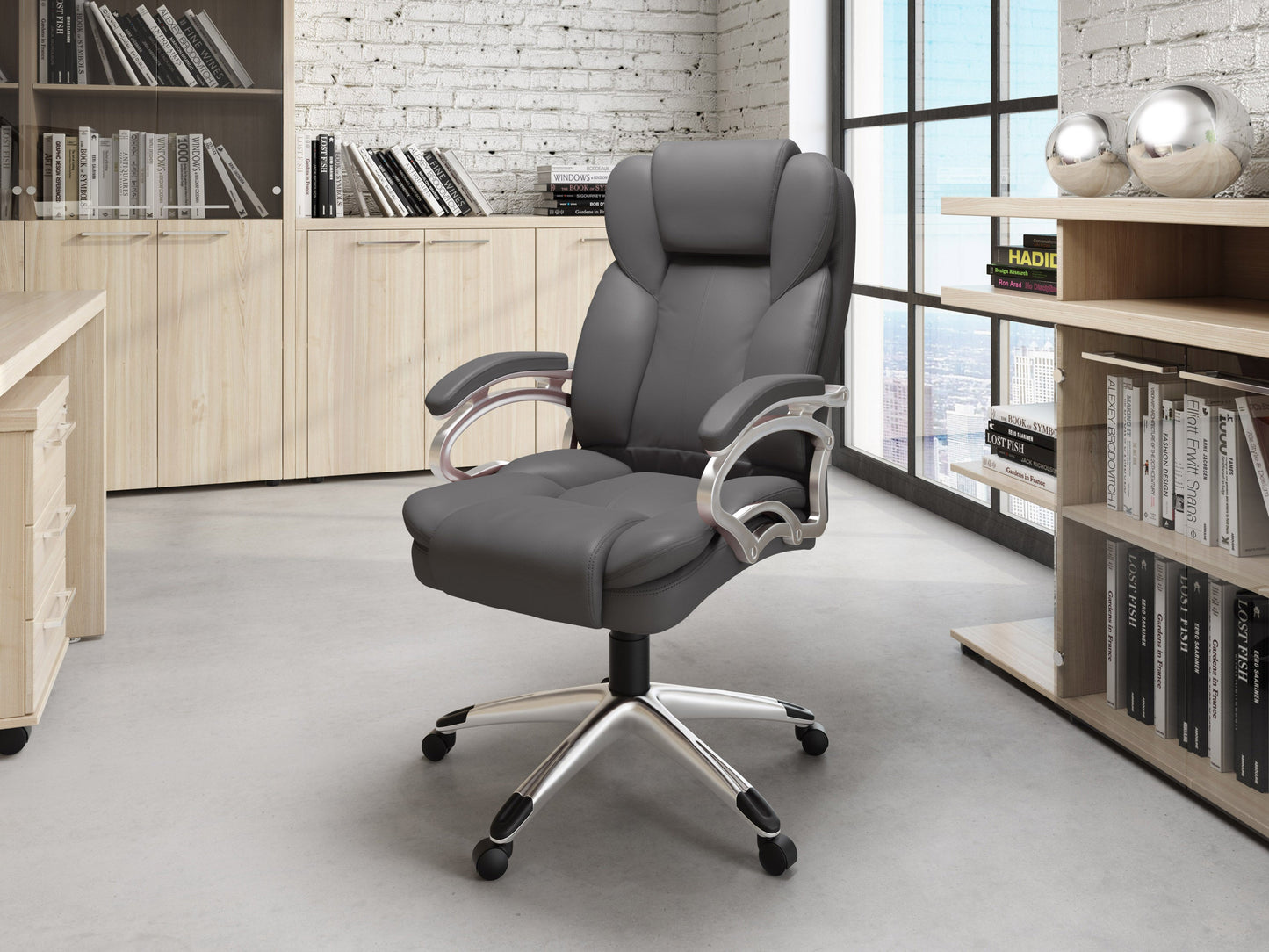 Grey executive office chair with ergonomic design, adjustable height, padded armrests, and breathable mesh back. Ideal for home or office use, this stylish chair combines comfort with modern aesthetics.