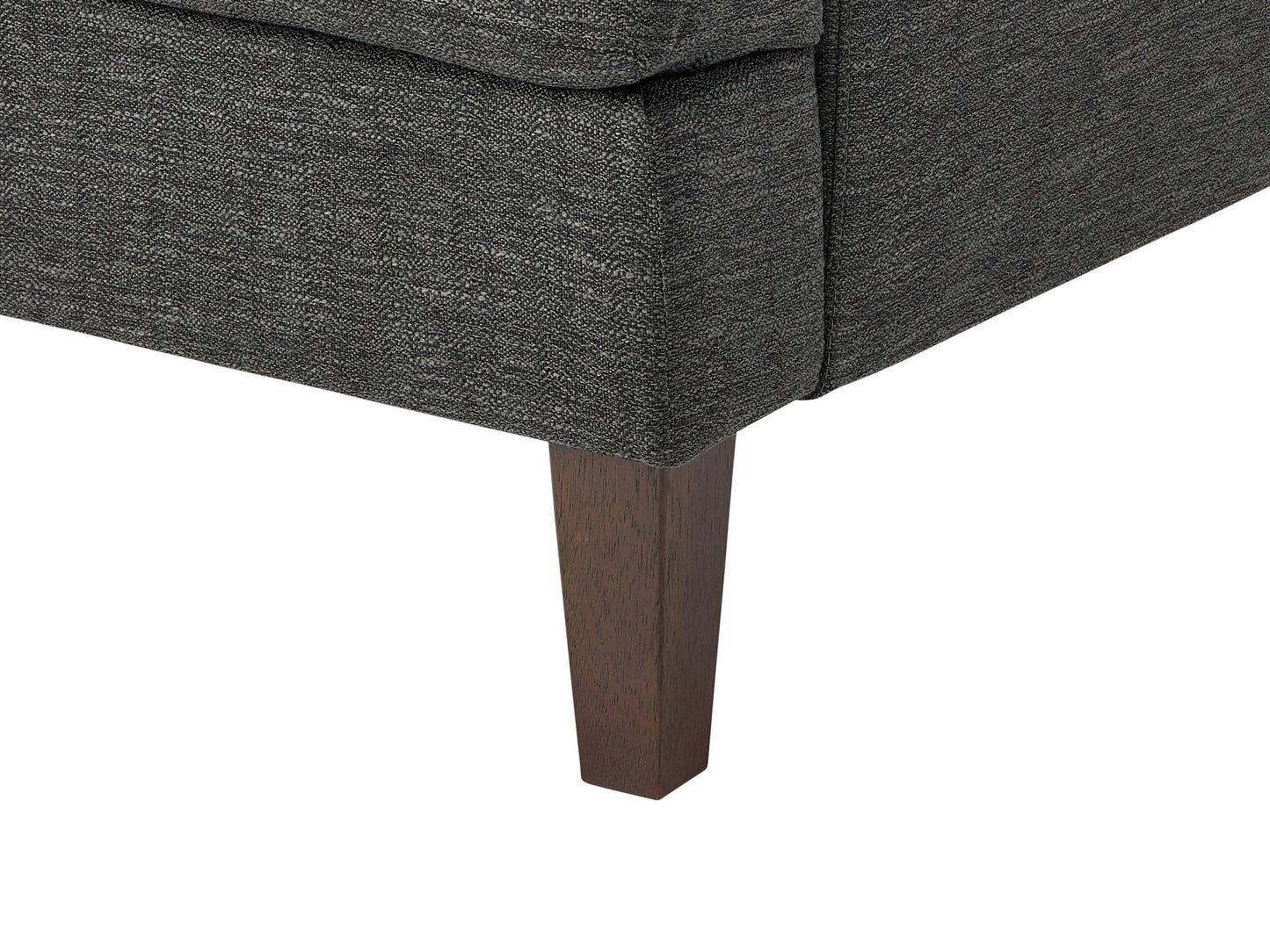 Dark grey mid-century armchair with wooden legs, upholstered in soft fabric, featuring a tufted backrest and padded seat, ideal for modern living rooms or offices.
