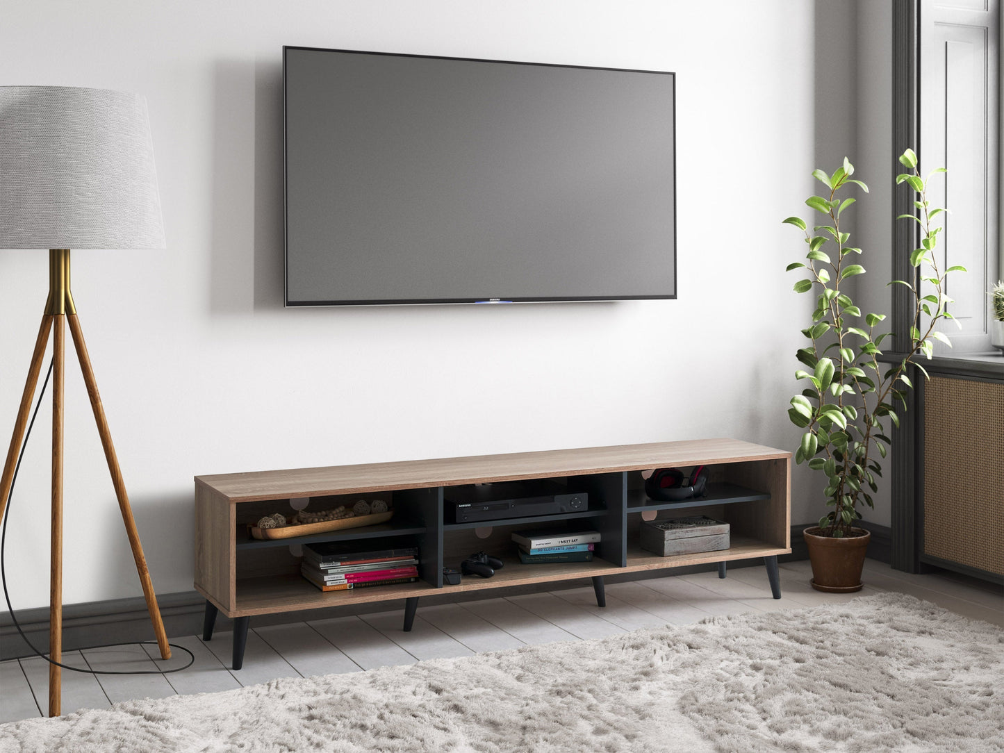 Light wood and grey TV stand with open shelves, suitable for TVs up to 85 inches. Modern design with ample storage space for media devices and accessories. Durable materials and sleek finish.