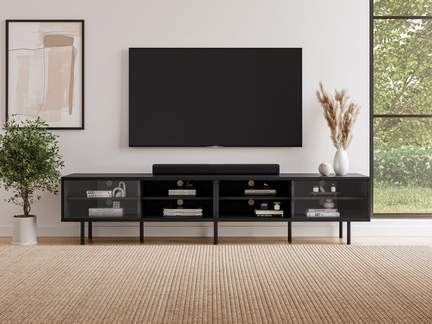 Modern modular TV stand in sleek black wood with adjustable shelves, cable management system, and sturdy metal legs, designed to support TVs up to 110 inches.