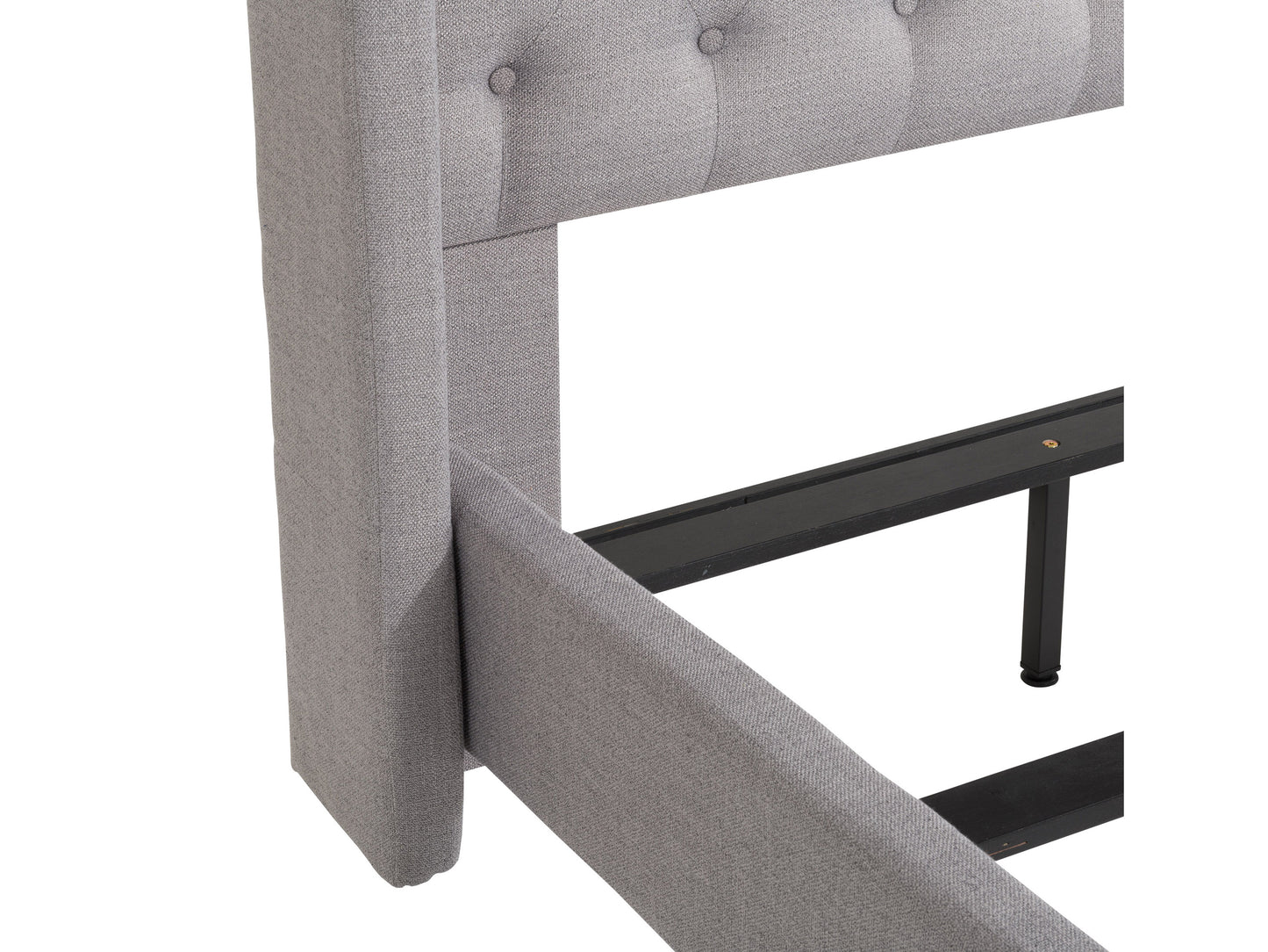 Tufted twin bed with light grey upholstery, wooden legs, and button-tufted headboard detail, perfect for a modern bedroom setting.
