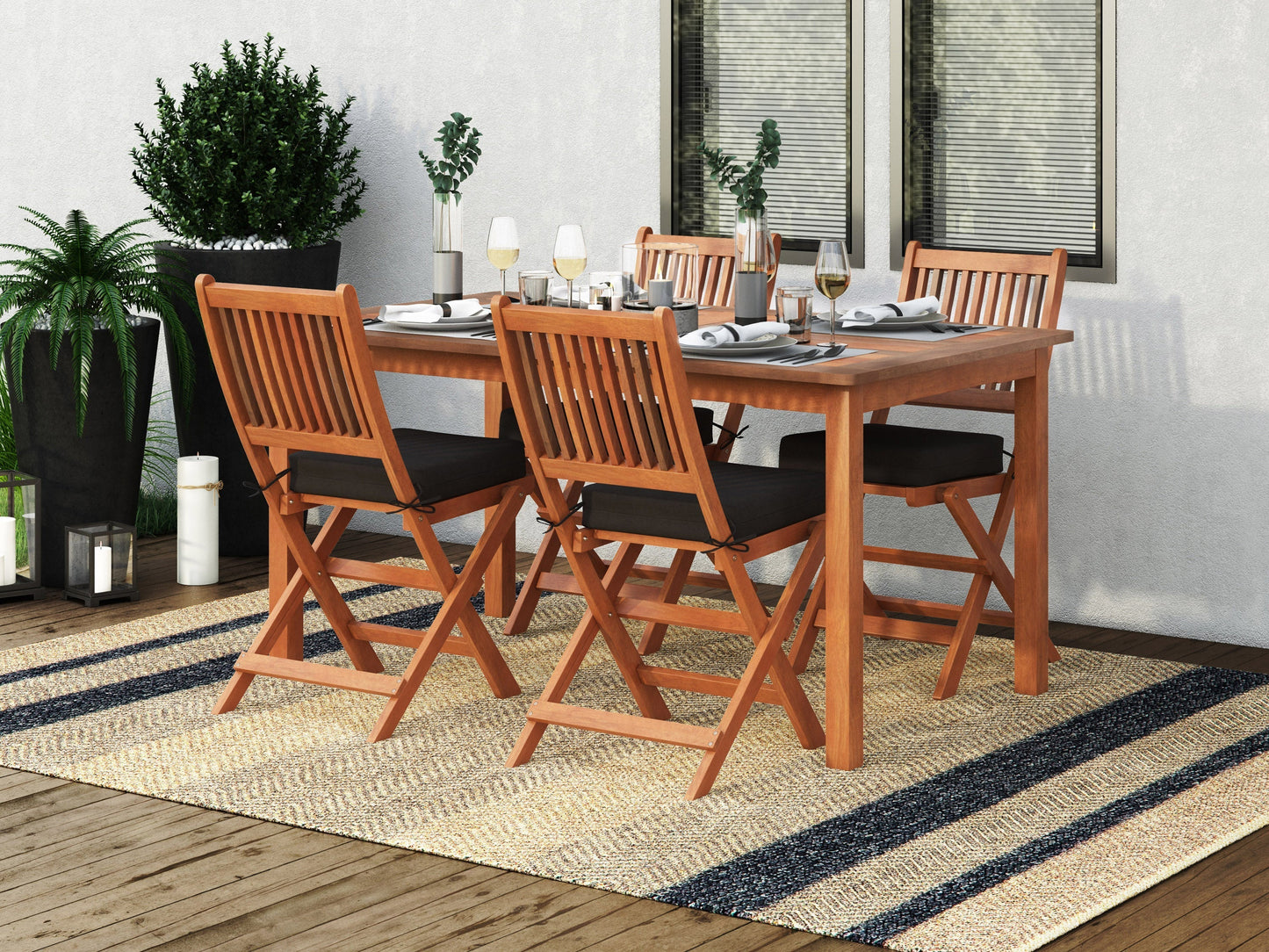 Modern 5-piece patio dining set with a rectangular table and four chairs. Features gray cushions, sleek black metal frames, and a slatted tabletop. Ideal for outdoor dining and entertaining.