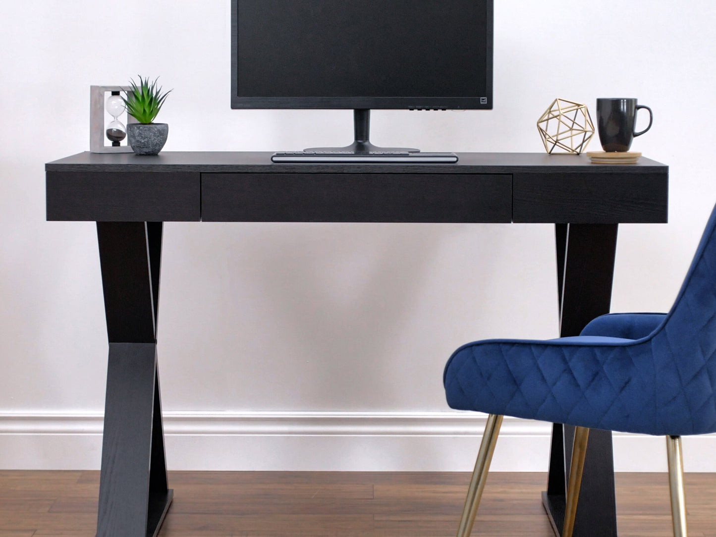 Farmhouse desk with a rustic wooden top, white distressed finish, and X-brace legs. Ideal for home office or study, blending vintage charm with modern functionality.