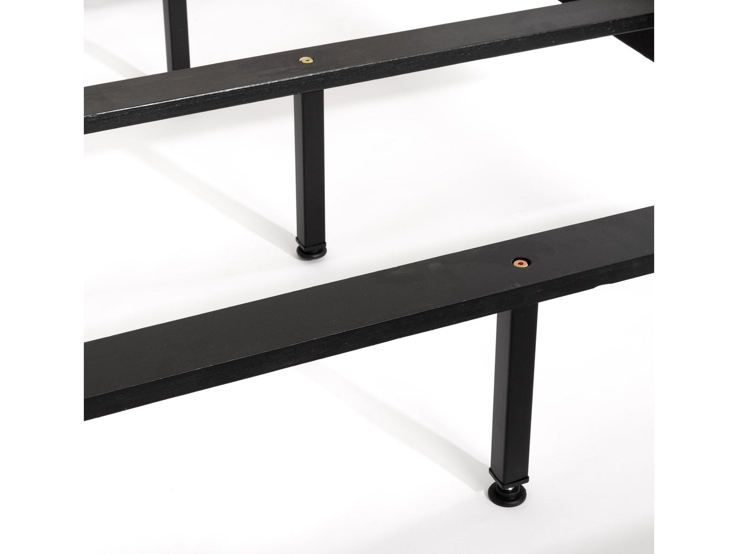 Dark grey tufted king bed with elegant button detailing on the headboard, upholstered in soft fabric. Sturdy wooden frame with sleek, modern design perfect for a contemporary bedroom.