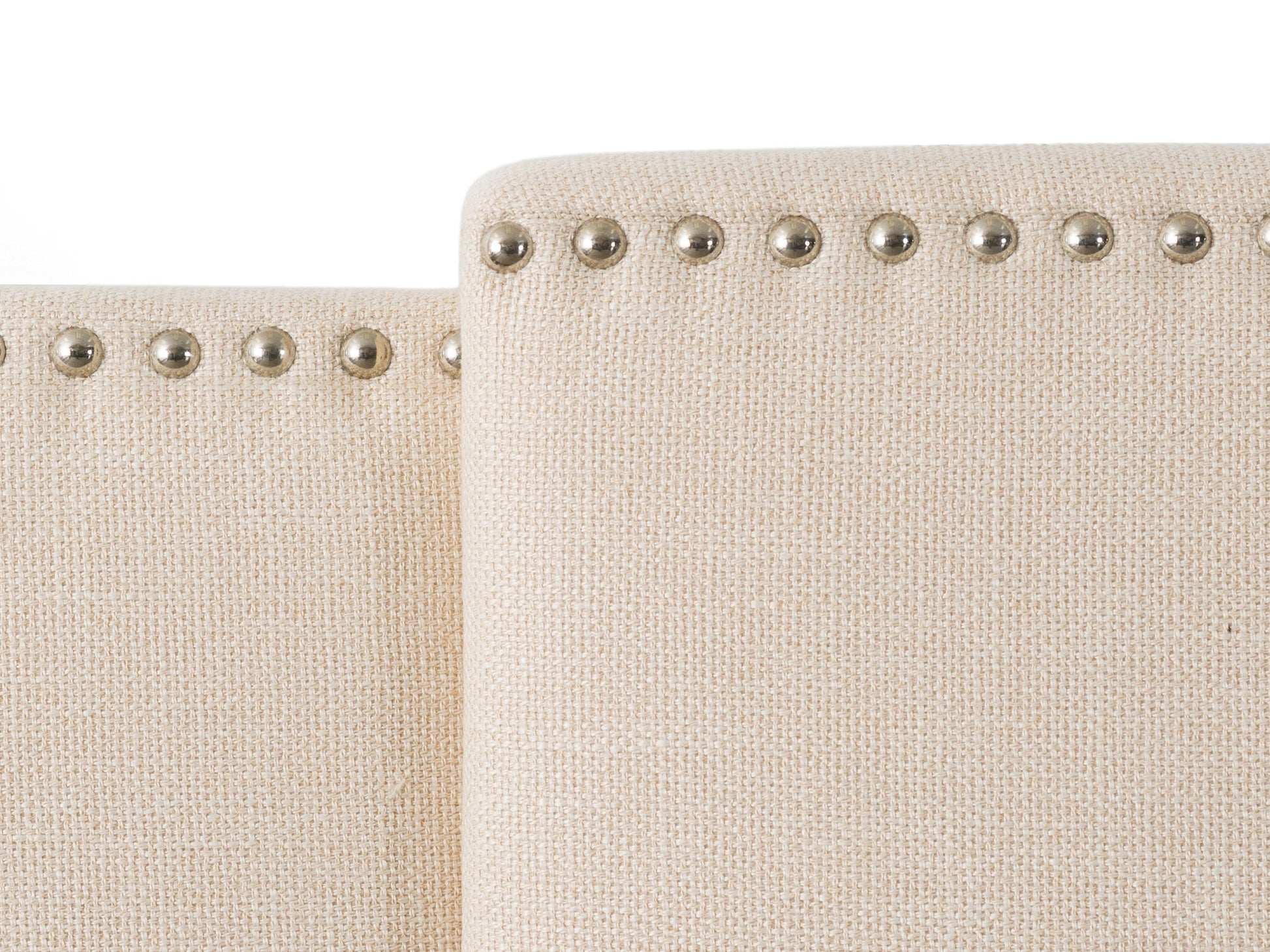 Cream adjustable headboard with tufted fabric, soft padding, and sleek design, compatible with various bed frames, ideal for modern or classic bedroom decor.