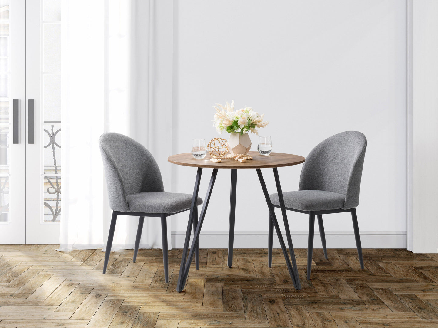 Small round dining table in rich brown wood finish, featuring sleek modern design with sturdy legs and smooth tabletop, perfect for compact dining spaces and contemporary interiors.