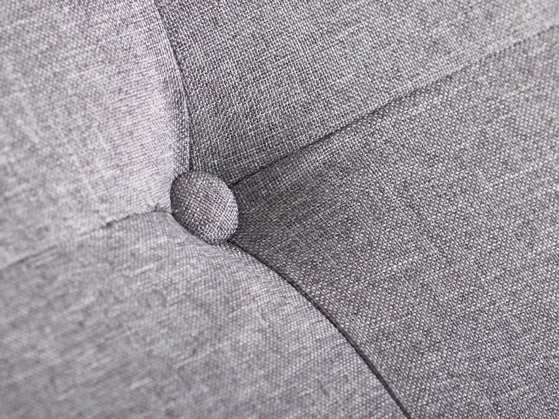 Light grey large storage ottoman with tufted top, soft fabric upholstery, and wooden legs. Ideal for living rooms or bedrooms, providing extra seating and hidden storage space.
