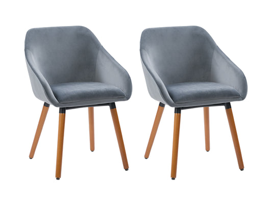 Set of 2 grey velvet dining chairs with tufted backs, sleek black metal legs, and plush cushioning for modern dining rooms.