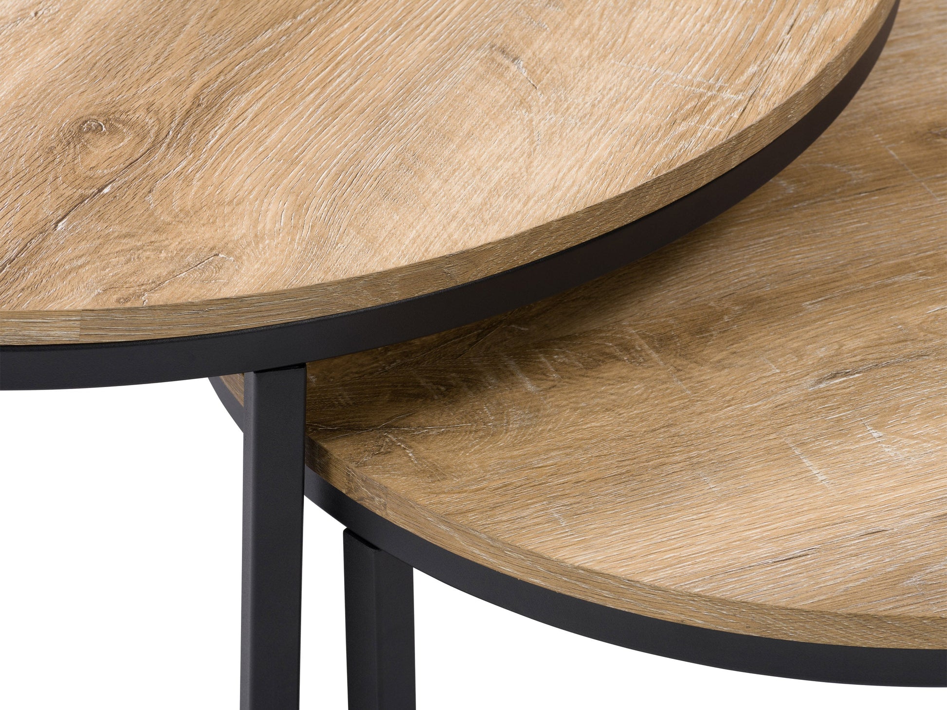 Light wood round nesting coffee tables with a smooth finish, featuring a minimalist design and sturdy metal legs. Ideal for modern living rooms, these space-saving tables can be used together or separately.
