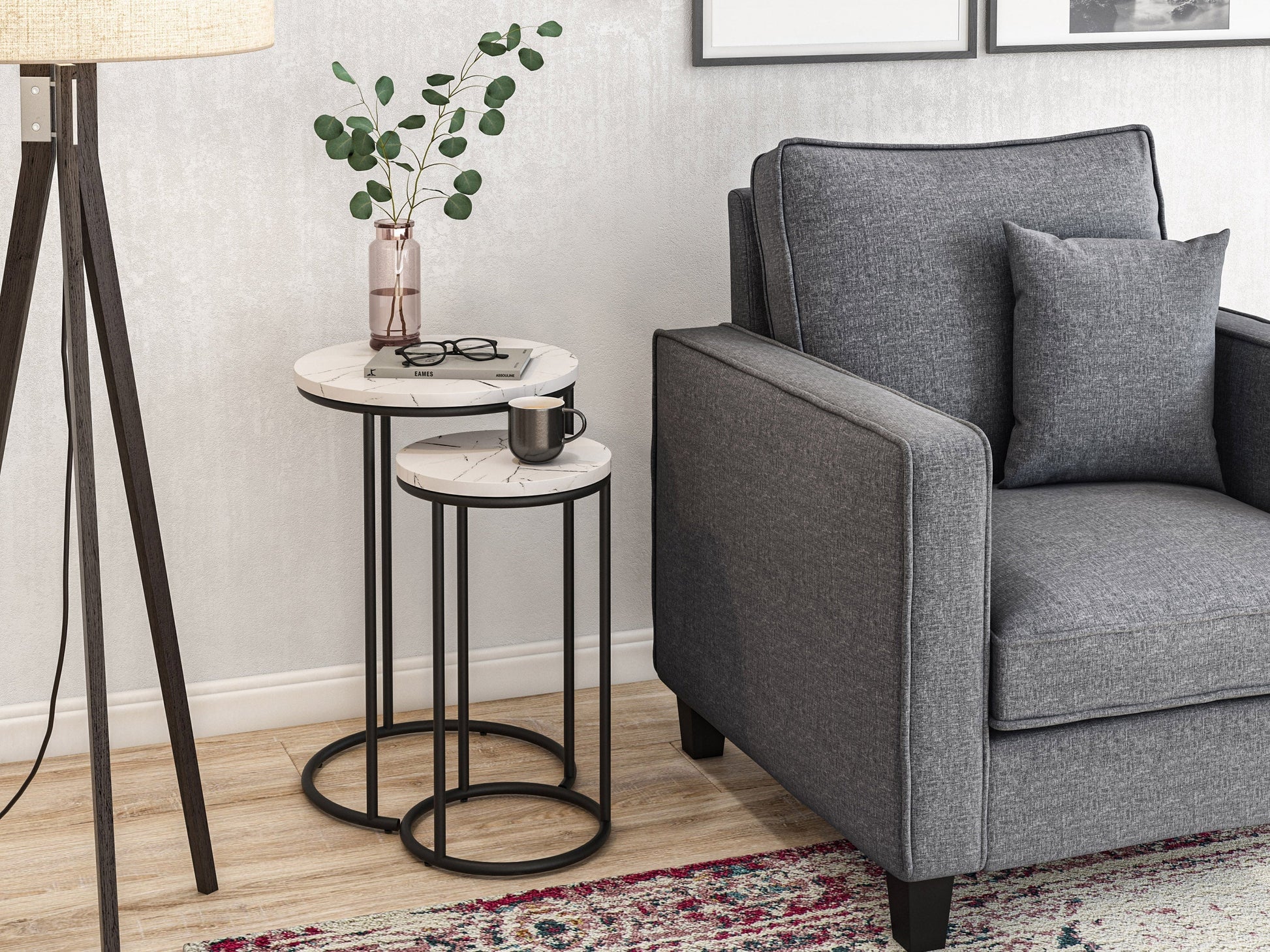 White marble round nesting side tables with gold metal frames, sleek modern design, and smooth polished surfaces, perfect for living room or bedroom decor.