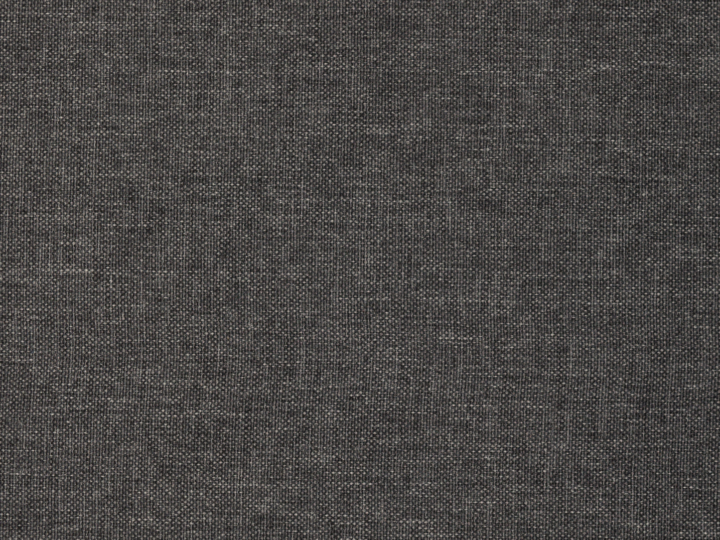 Grey fabric ottoman with tufted top, wooden legs, and soft texture, ideal for living room or bedroom decor.