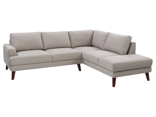 Light grey sectional sofa with right-facing chaise, featuring plush cushions, sleek modern design, and durable fabric upholstery. Perfect for contemporary living rooms seeking comfort and style.