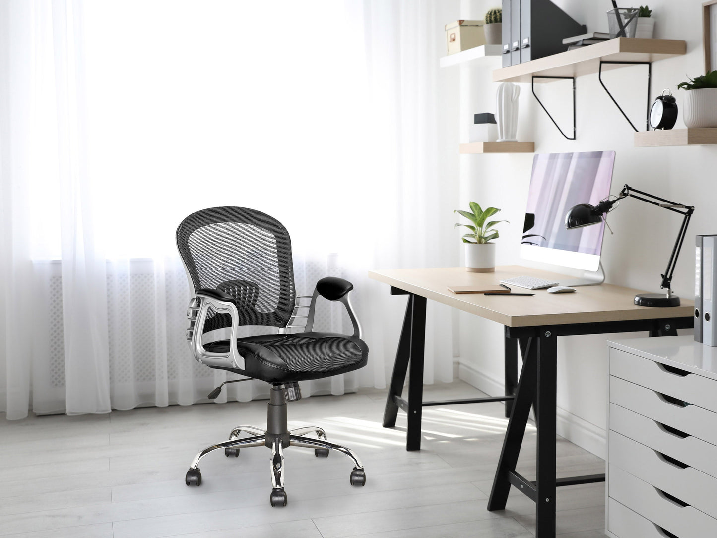 Black swivel office chair with ergonomic design, cushioned seat, adjustable height, and lumbar support. Features a sleek, modern look with a sturdy metal base and smooth-rolling casters. Ideal for home or office use.
