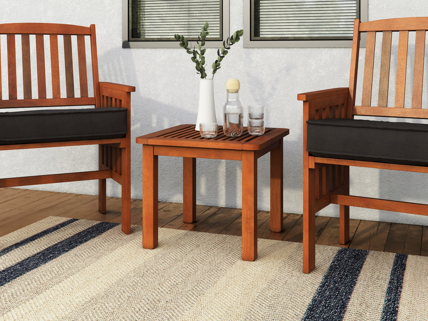 Brown hardwood outdoor side table with slatted top and sturdy legs, perfect for patio or garden use. Durable, weather-resistant material ideal for outdoor settings.