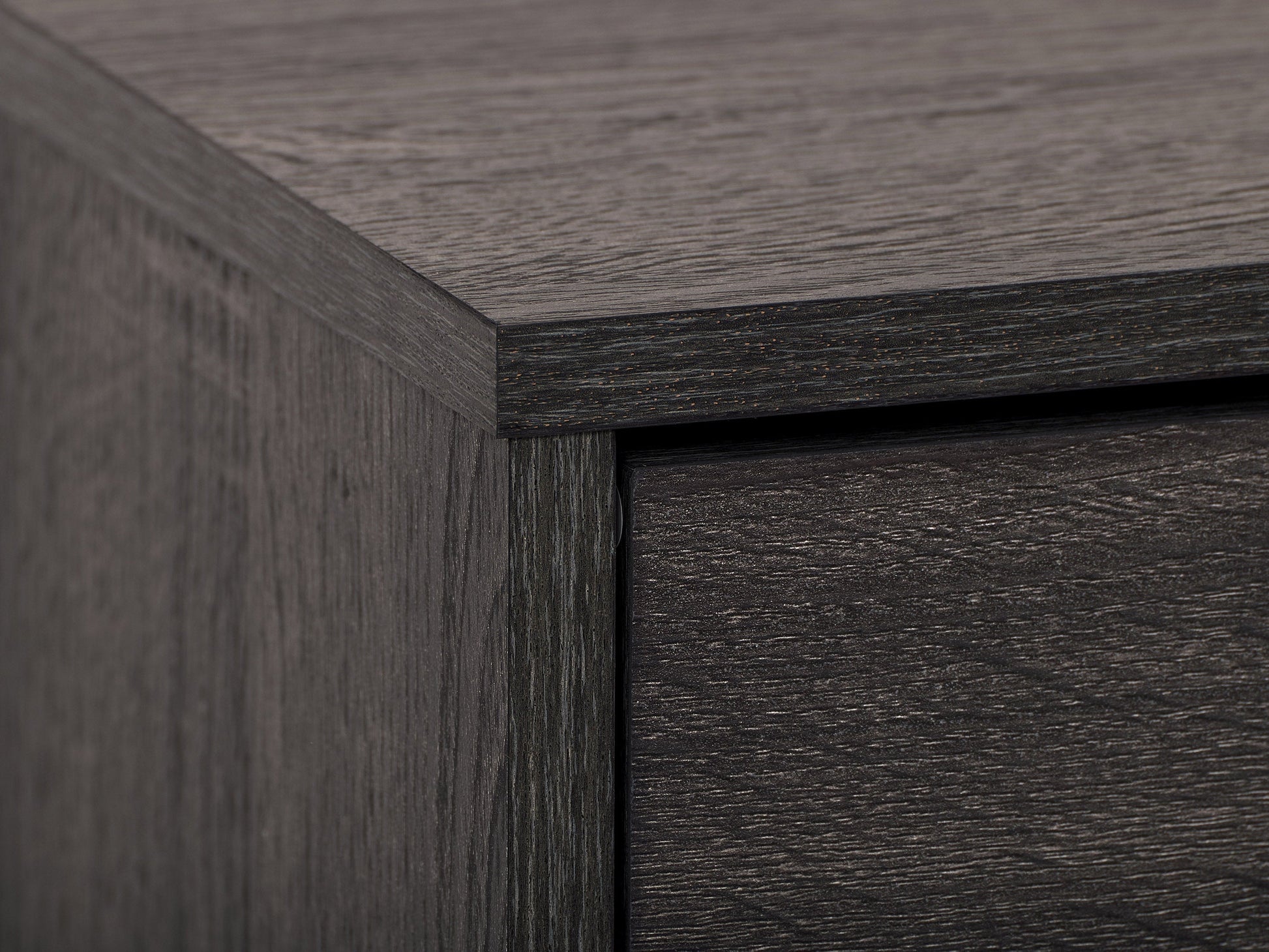Dark grey TV bench with open and closed storage compartments, suitable for TVs up to 85 inches. Features sleek design, sturdy construction, and ample space for media devices and accessories.