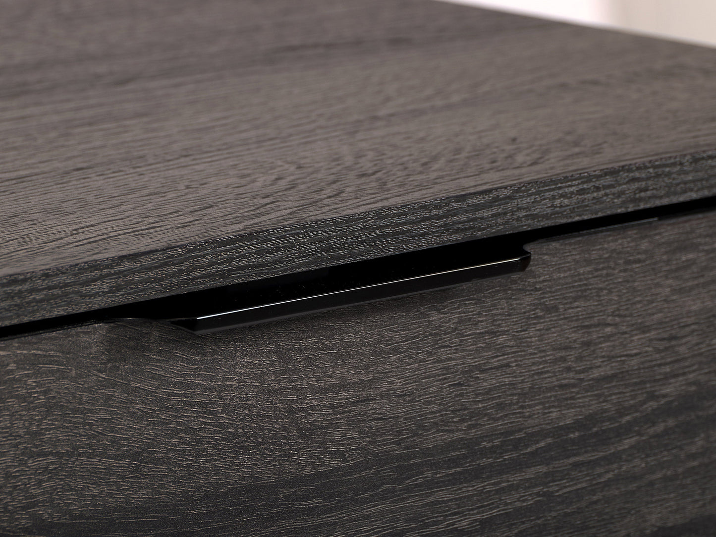 Dark grey TV bench with open and closed storage compartments, suitable for TVs up to 85 inches. Features sleek design, sturdy construction, and ample space for media devices and accessories.