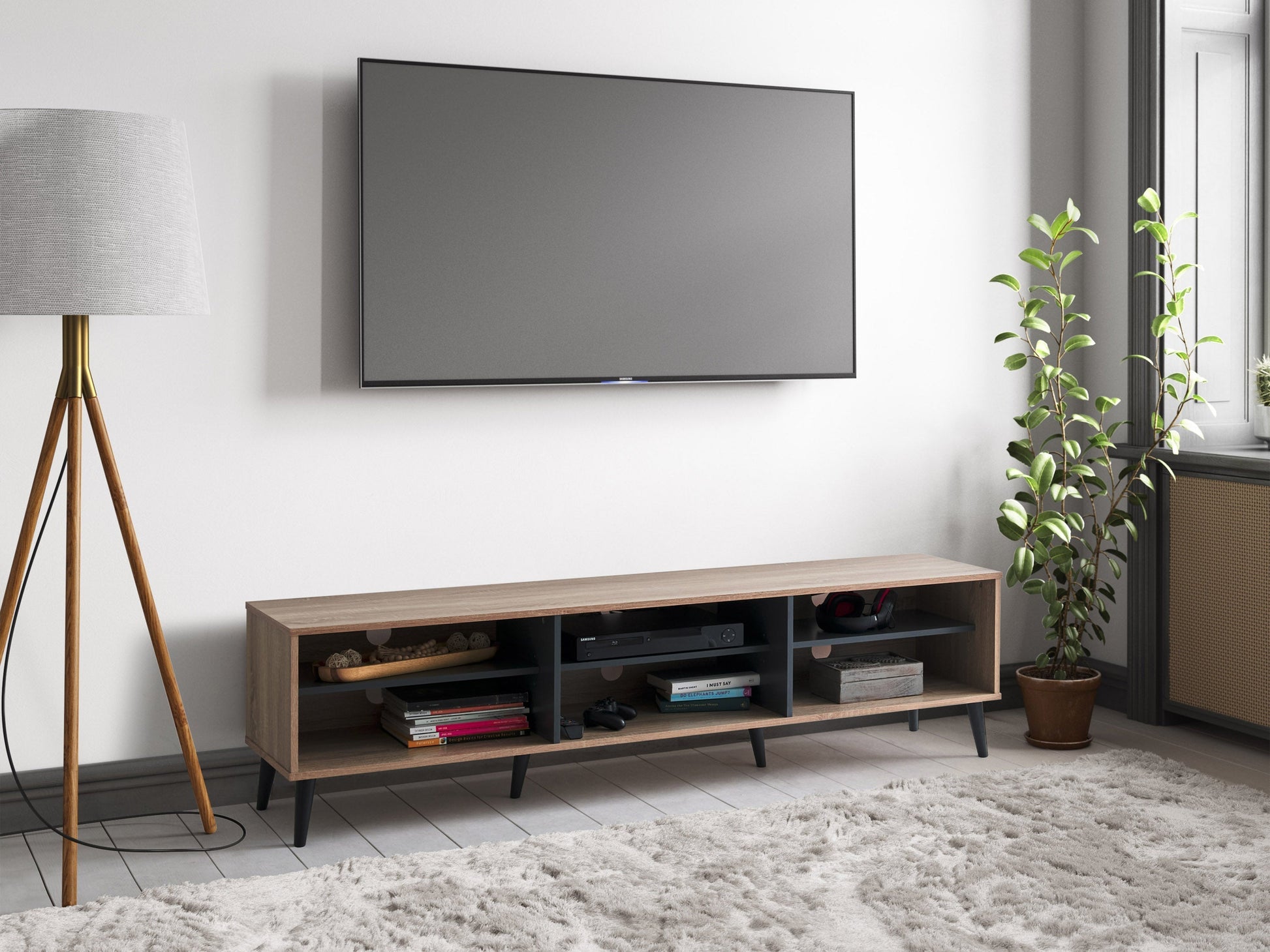 Light wood and grey TV stand with open shelves, suitable for TVs up to 85 inches. Modern design with ample storage space for media devices and accessories. Durable materials and sleek finish.