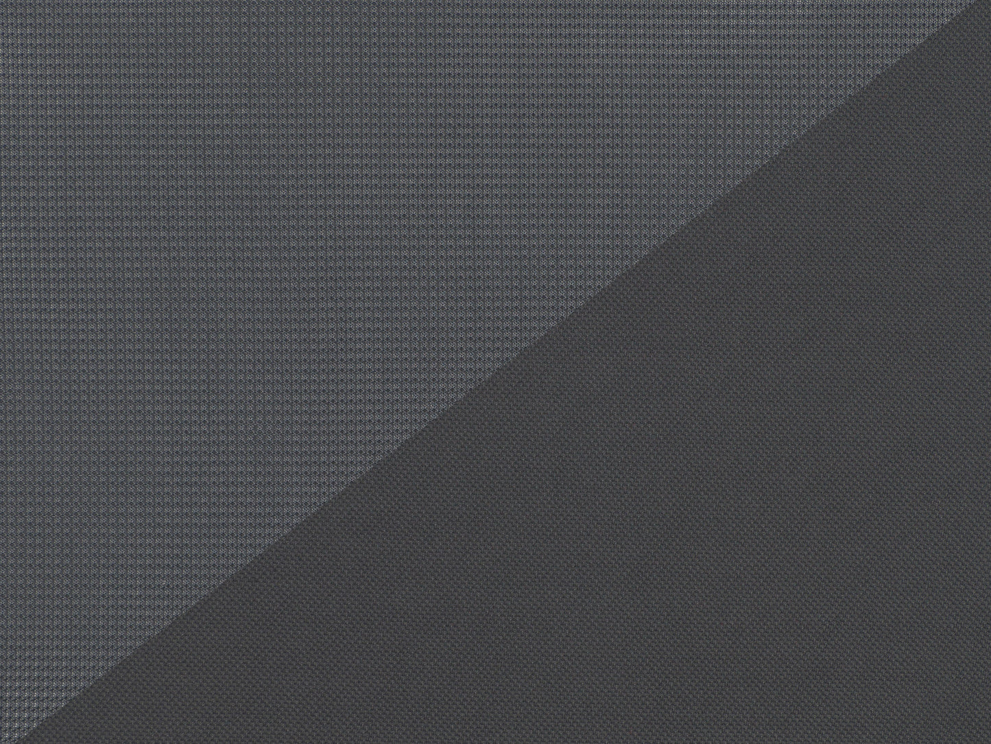 Grey mesh office chair with ergonomic design, adjustable armrests, lumbar support, and swivel base. Ideal for home or office use, providing comfort and breathability for long hours of work.