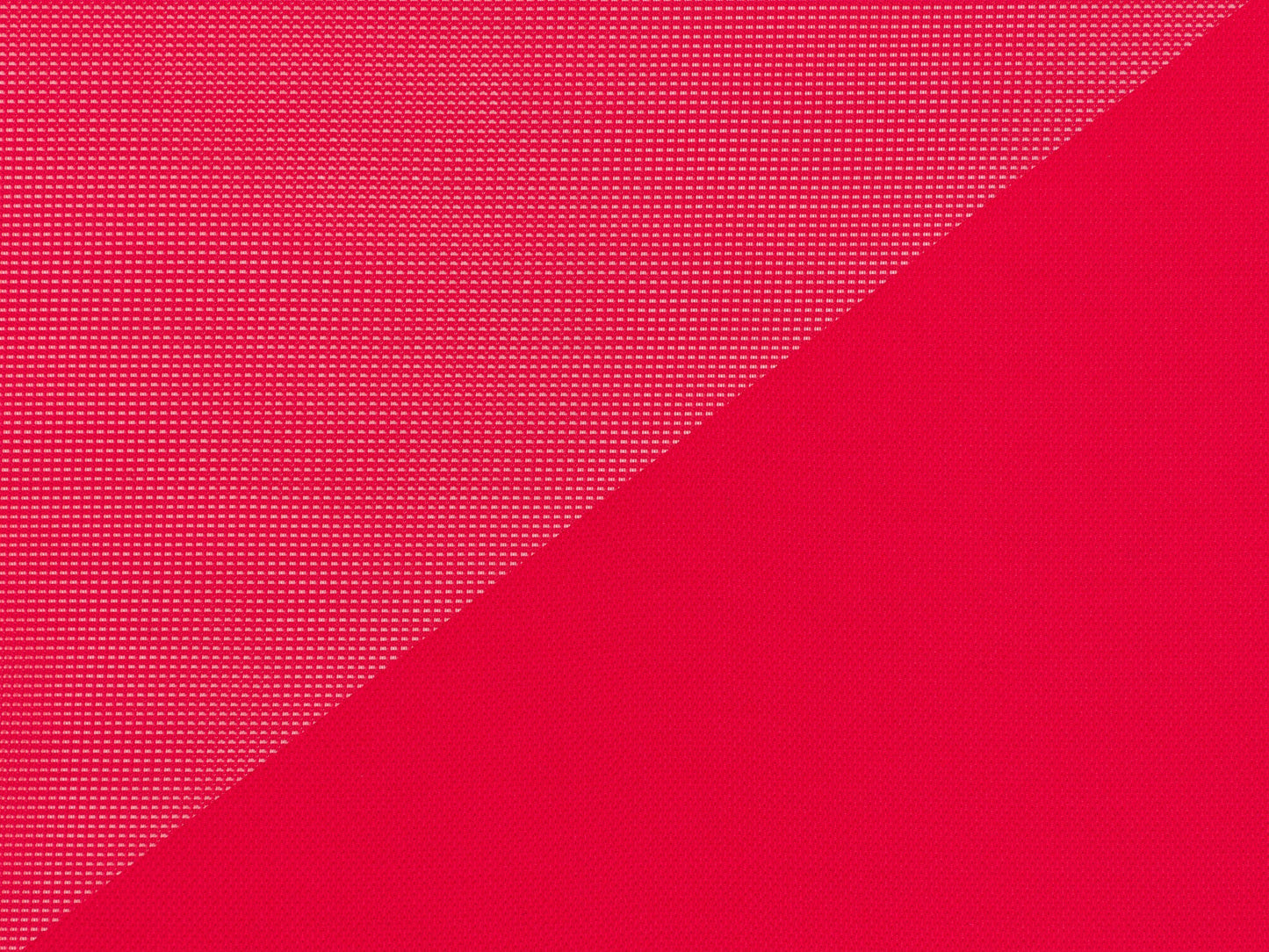 Red mesh office chair with ergonomic design, adjustable armrests, and lumbar support. Features breathable mesh back, cushioned seat, and swivel base with caster wheels, ideal for home or office use.