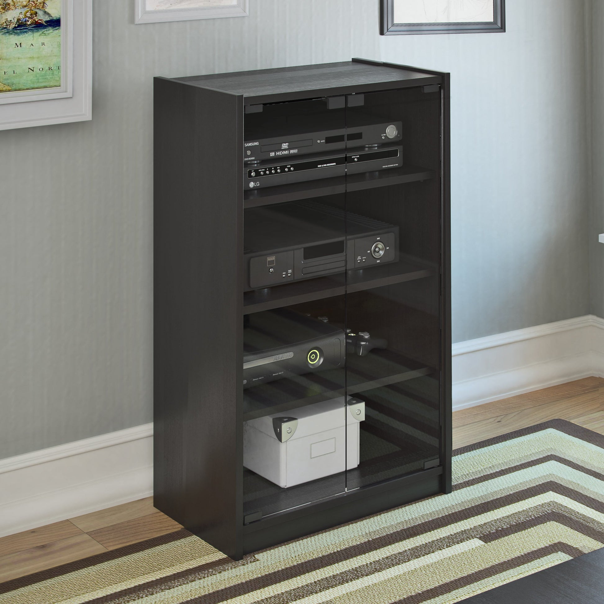 Dark wood media storage cabinet with doors, 21 inches tall, featuring sleek metal handles, adjustable shelves, and a modern design perfect for organizing DVDs, games, and electronics in a stylish living room setup.