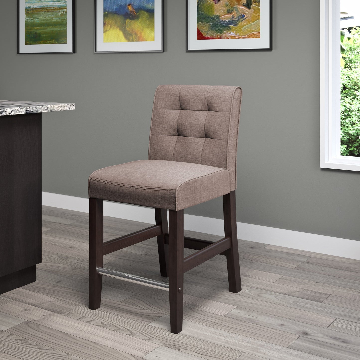 Brown bar stool with cushioned seat, counter height, featuring dark wood legs and a footrest, perfect for kitchen islands or home bars.