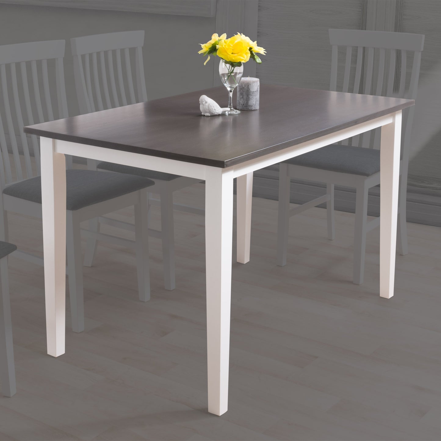 Grey and white dining table with sleek rectangular surface, modern metal legs, and smooth finish, perfect for contemporary dining rooms.