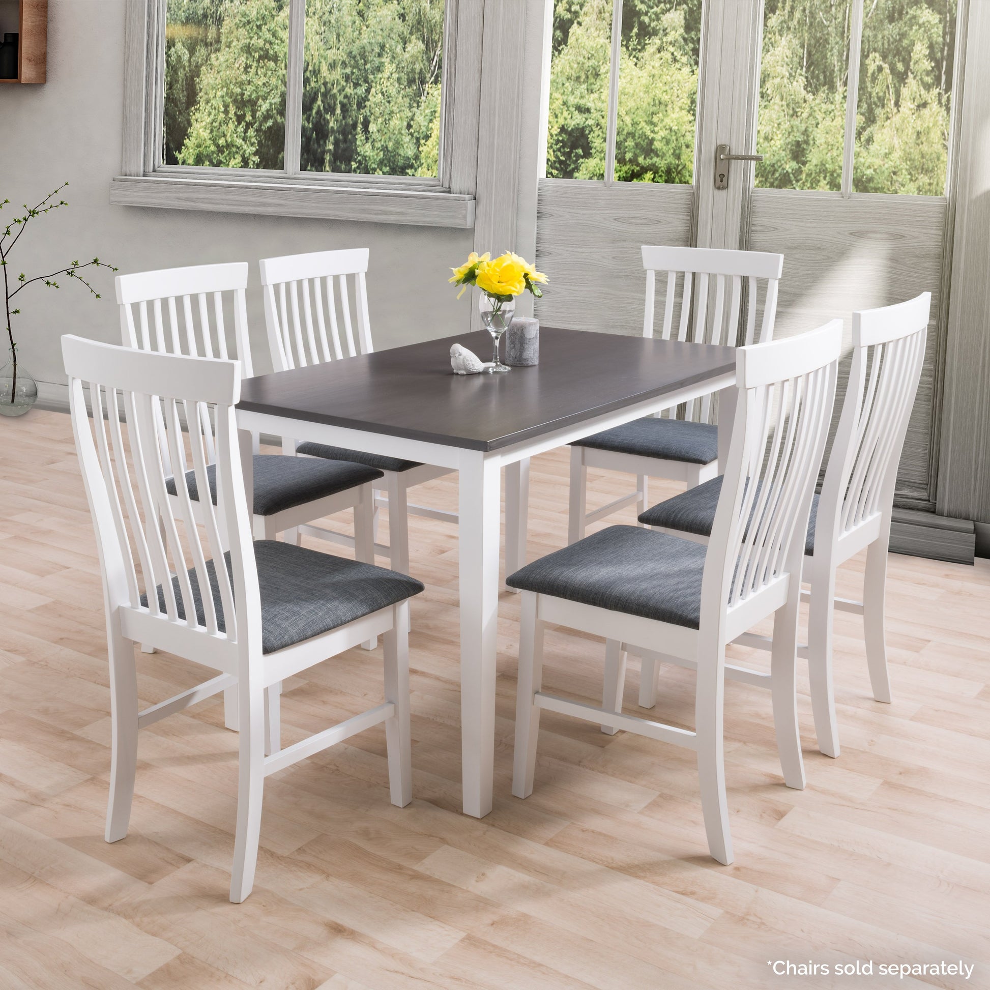 Grey and white dining table with sleek, modern design, featuring a smooth grey tabletop and sturdy white legs, ideal for contemporary dining rooms and kitchens.