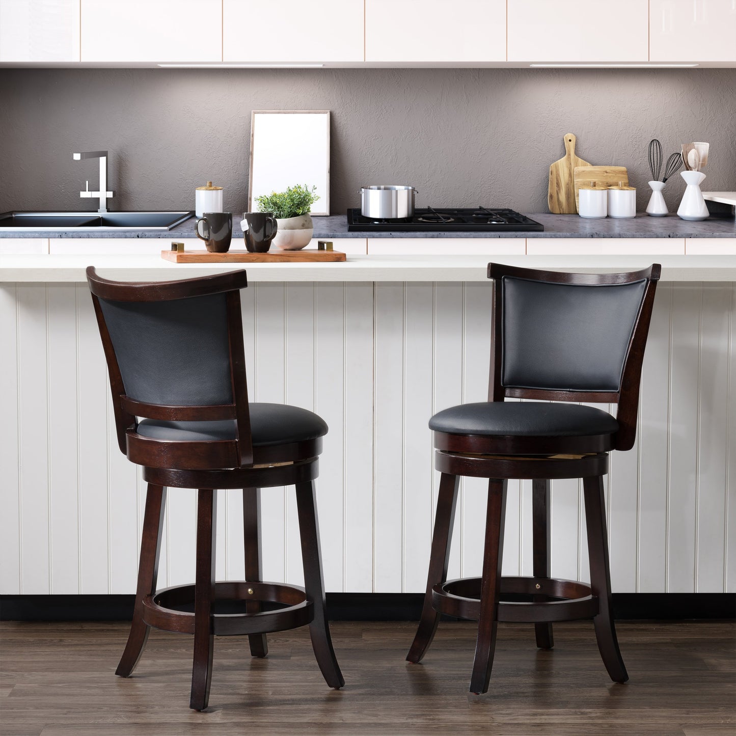 Set of 2 counter height bar stools with cushioned seats, featuring a sleek black metal frame and dark brown faux leather upholstery, perfect for modern kitchens and home bars.
