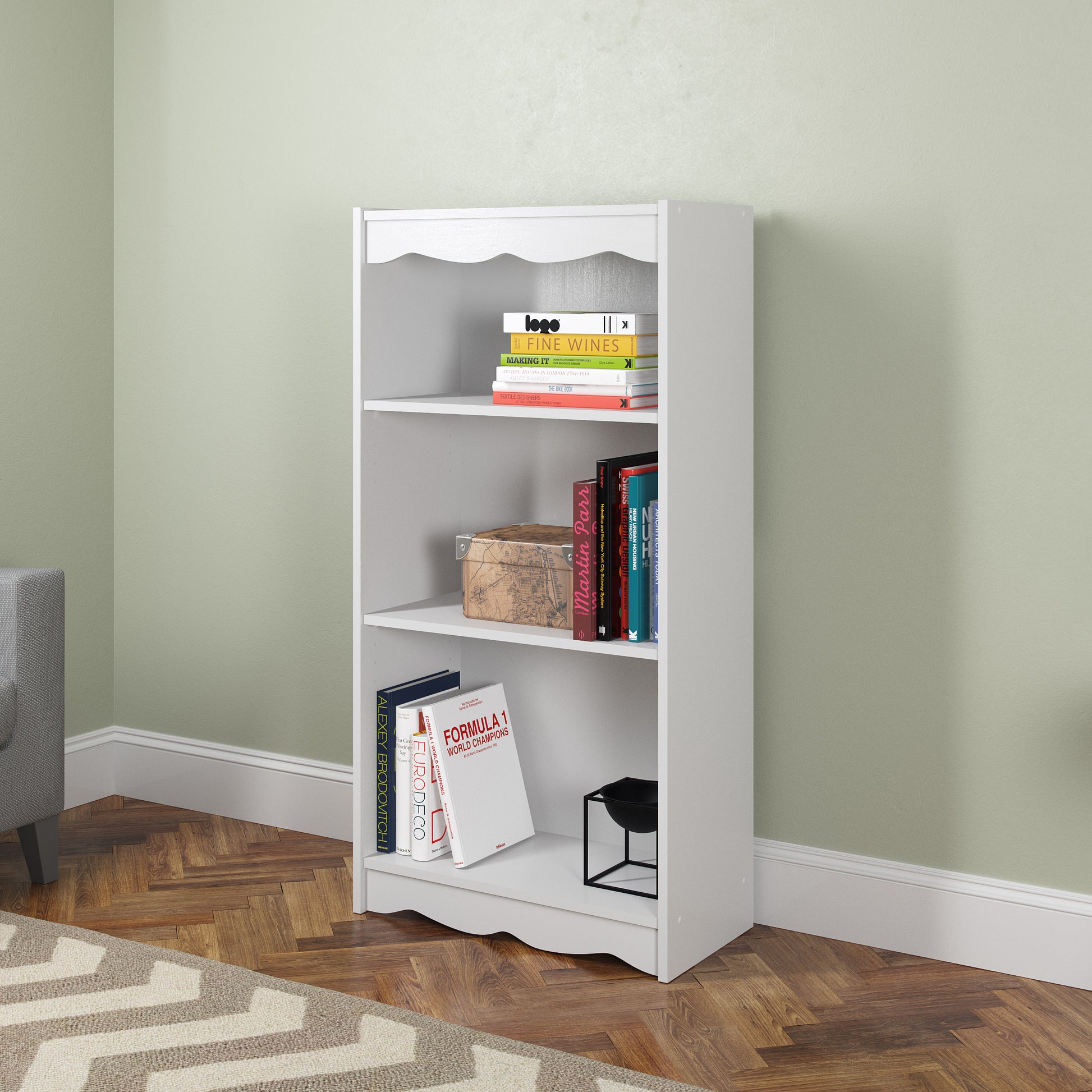 White small bookcase, 48 inches tall, with three open shelves, displaying books and decorative items, made of wood with a smooth finish, ideal for modern home or office storage and organization.