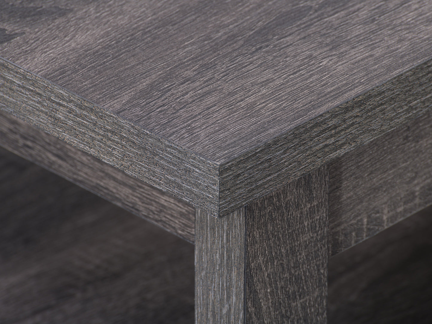 Mid-century modern coffee table with walnut wood finish, featuring a sleek rectangular top, tapered legs, and smooth edges. Ideal for living rooms, this stylish piece combines functionality with timeless design.