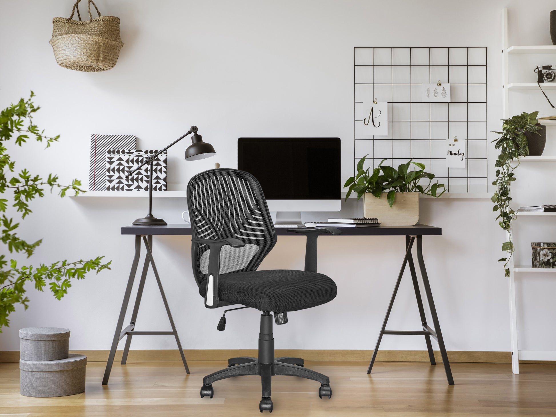 Black mesh office chair with ergonomic design, adjustable height, and lumbar support. Features breathable mesh backrest, cushioned seat, and sleek armrests. Ideal for home office or professional workspace.