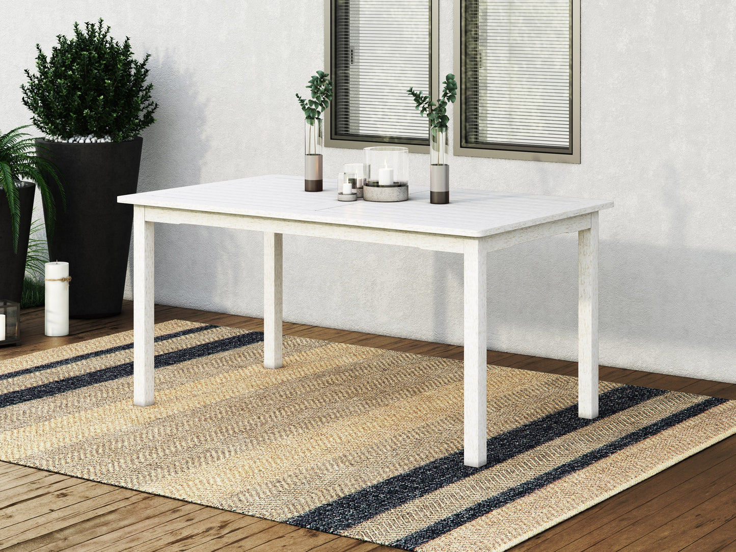 Washed white outdoor wood dining table with slatted top and sturdy legs, perfect for patio dining. Durable wooden construction with a rustic finish, designed for outdoor use. Ideal for garden or backyard settings.
