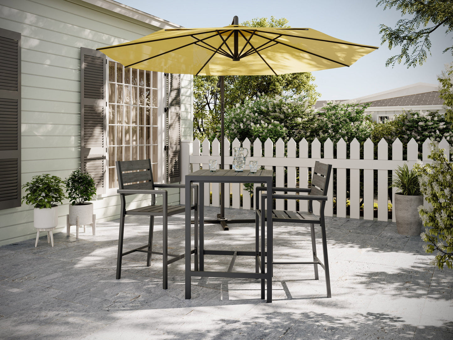 3-piece outdoor patio bar set with two brown wicker bar stools and a matching high-top table with a glass surface, featuring durable, weather-resistant materials perfect for backyard or garden use.