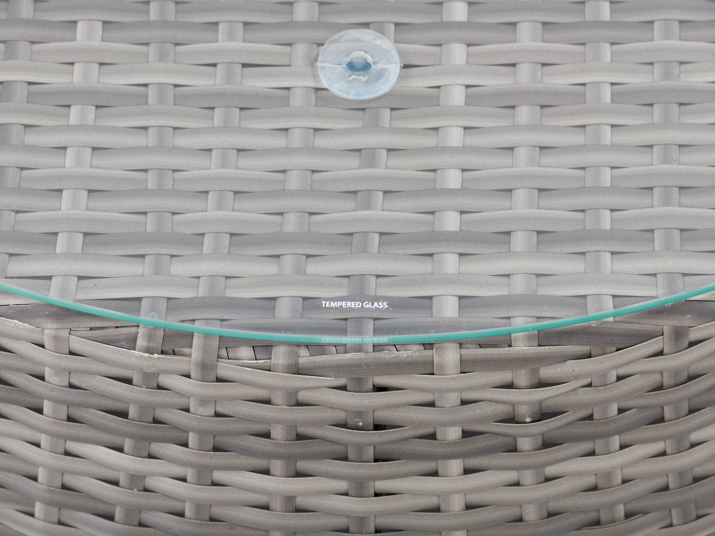 Circular outdoor seating set, 5-piece patio sectional in neutral beige and gray tones, featuring plush cushions, woven rattan texture, and a round coffee table with glass top, perfect for garden or patio lounging.