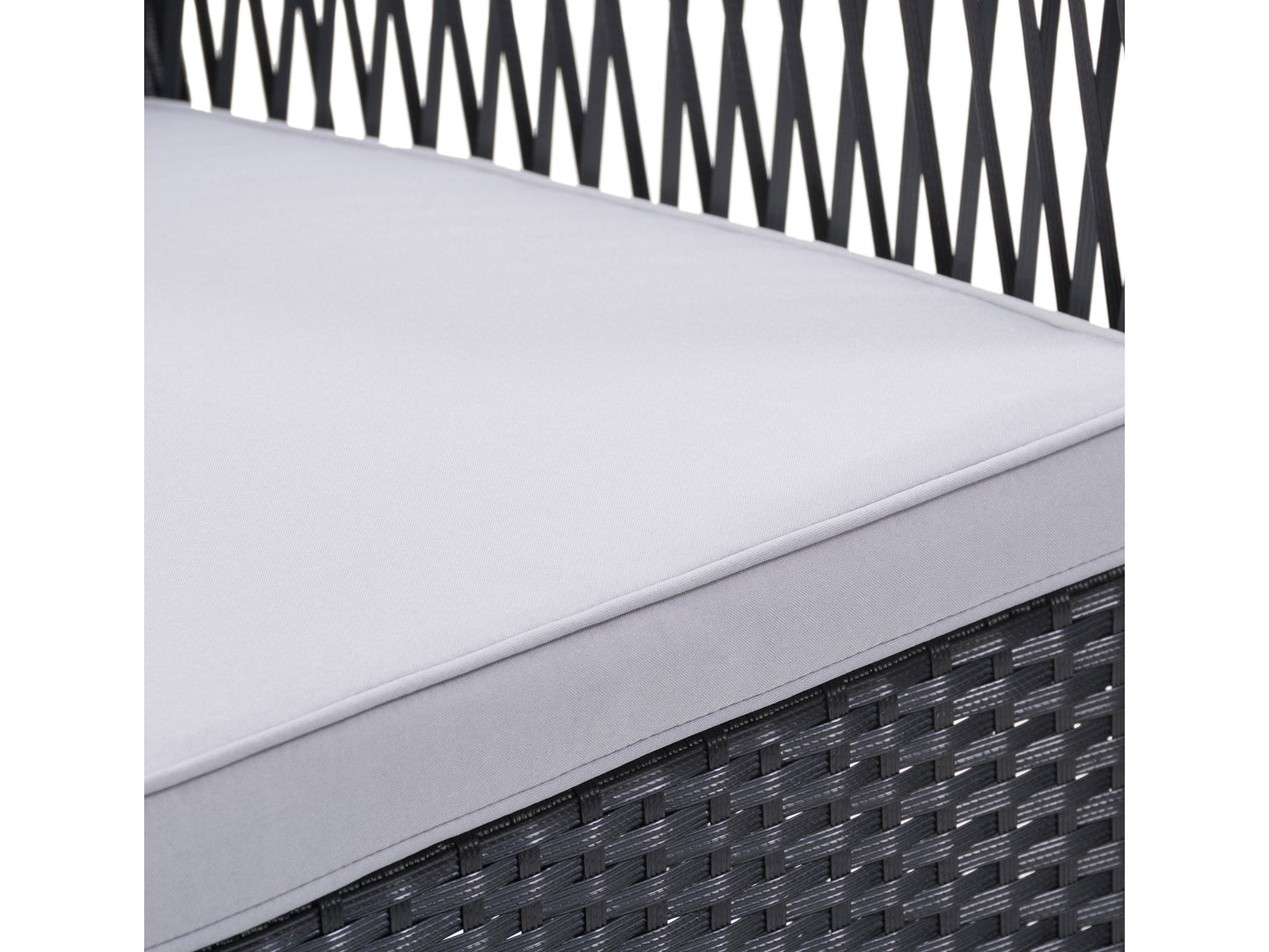 4-piece patio conversation set with grey cushions, black metal frames, and a glass-top coffee table, featuring modern design and weather-resistant materials for outdoor use.