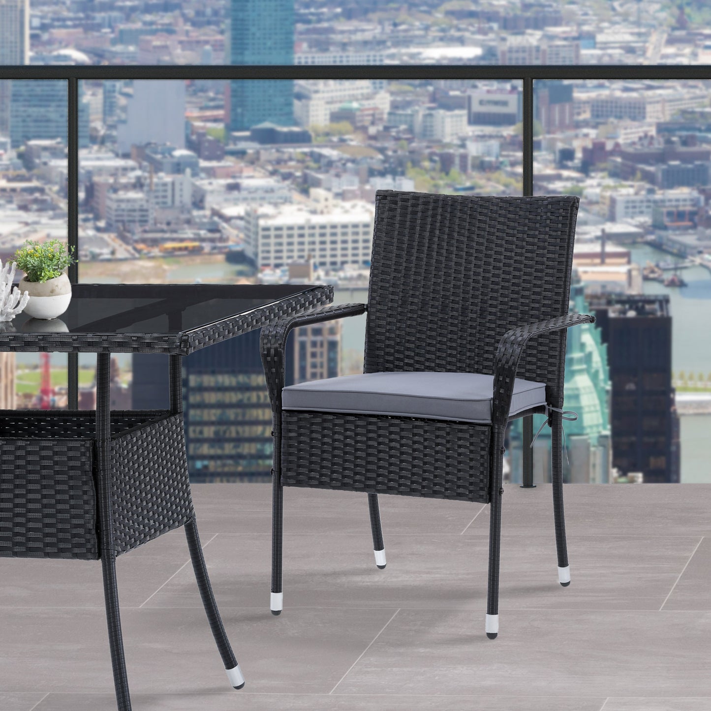 Black wicker stackable patio chairs with beige cushions, featuring a modern design, weather-resistant materials, and sturdy metal frames. Ideal for outdoor seating, garden, or balcony use. Set of 2.