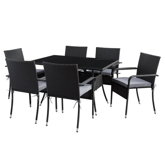 Gray wicker patio dining set with six cushioned chairs, rectangular glass-top table, and weather-resistant materials, perfect for outdoor dining and entertaining.