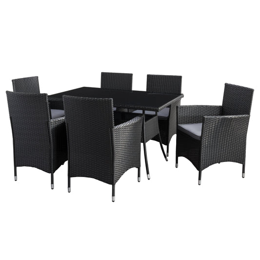 Gray wicker patio dining set with six cushioned chairs, rectangular glass-top table, and weather-resistant materials, perfect for outdoor dining and entertaining.