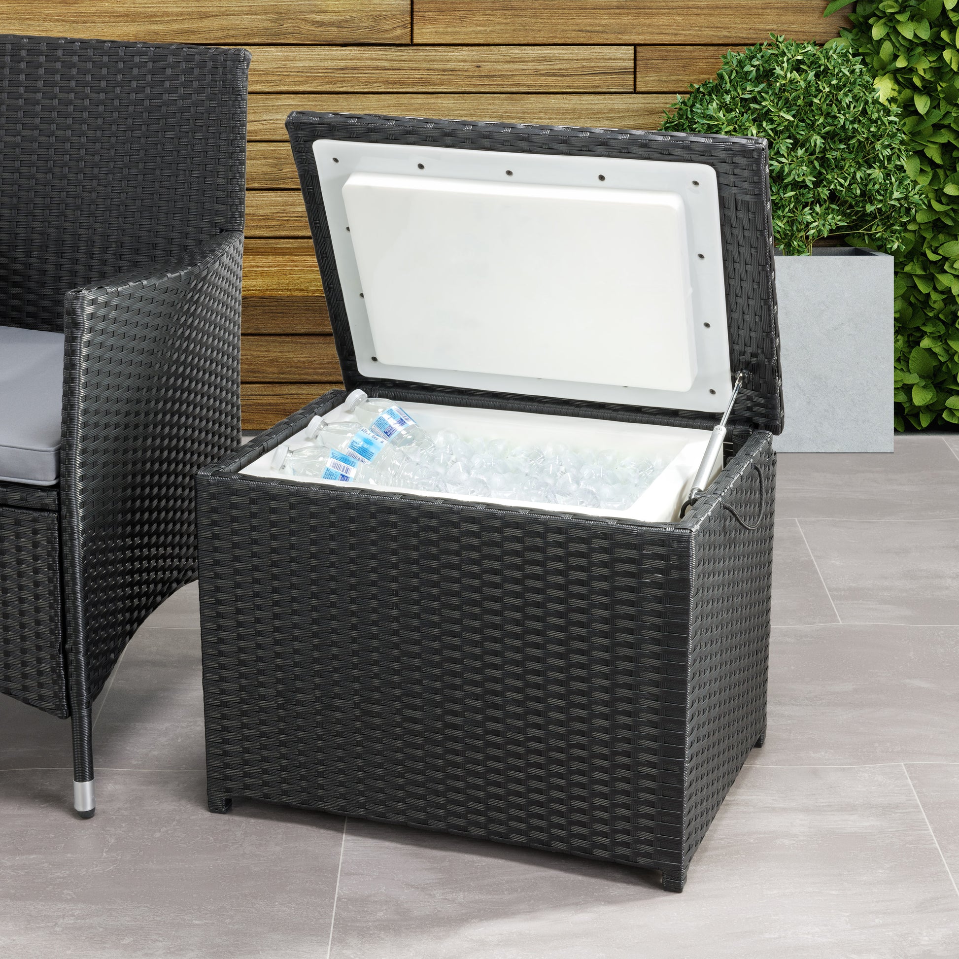 Gray outdoor cooler table with wicker texture, featuring a lift-top design for easy access to drinks and snacks, and a sleek, modern look perfect for patio storage and entertaining.