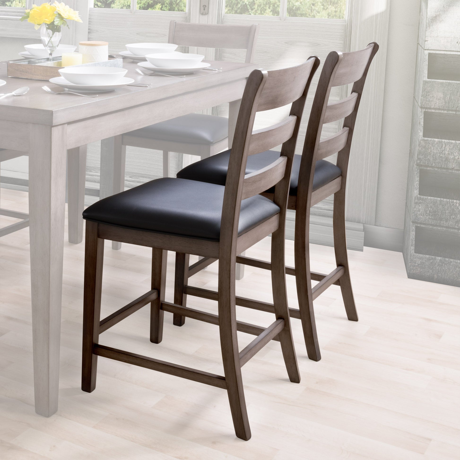 Modern counter height dining chairs, set of 2, featuring sleek black metal legs and cushioned seats with light grey fabric upholstery, perfect for contemporary dining spaces.