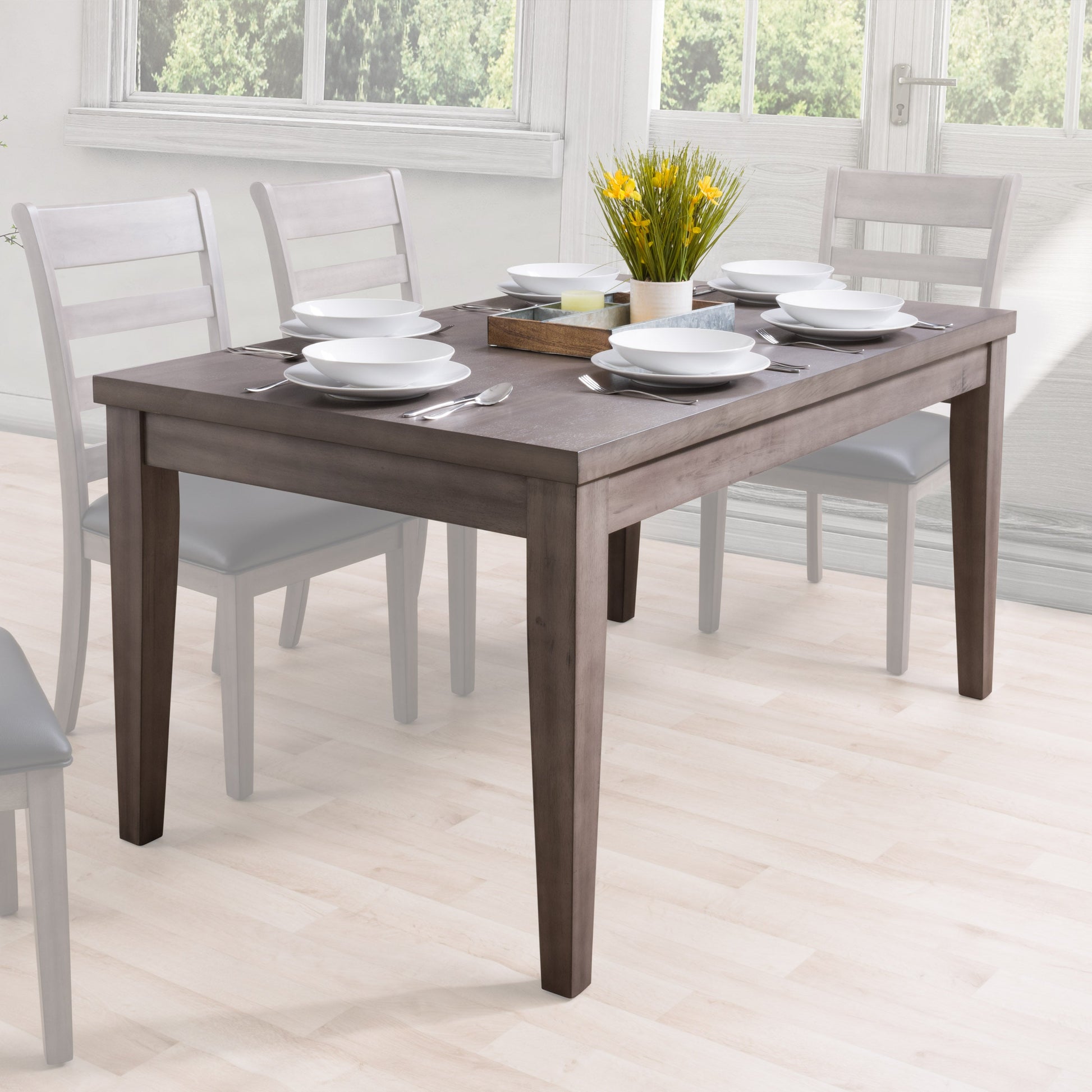 Rustic wooden dining table with natural finish, featuring sturdy legs and a smooth, spacious surface, perfect for family meals or gatherings. Ideal for farmhouse or modern decor styles.