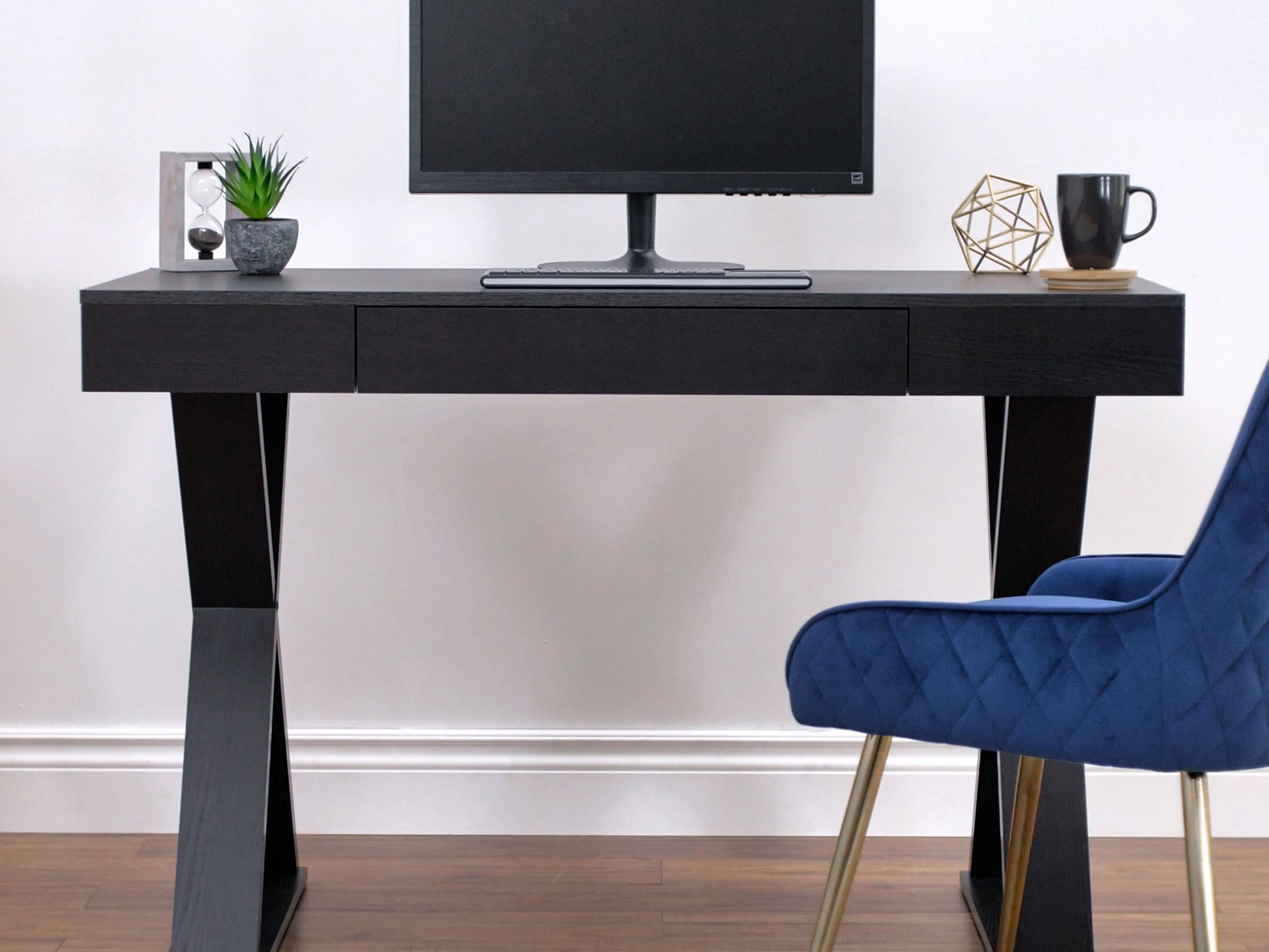 Farmhouse desk with a rustic wooden top, white distressed finish, and X-brace legs. Ideal for home office or study, blending vintage charm with modern functionality.