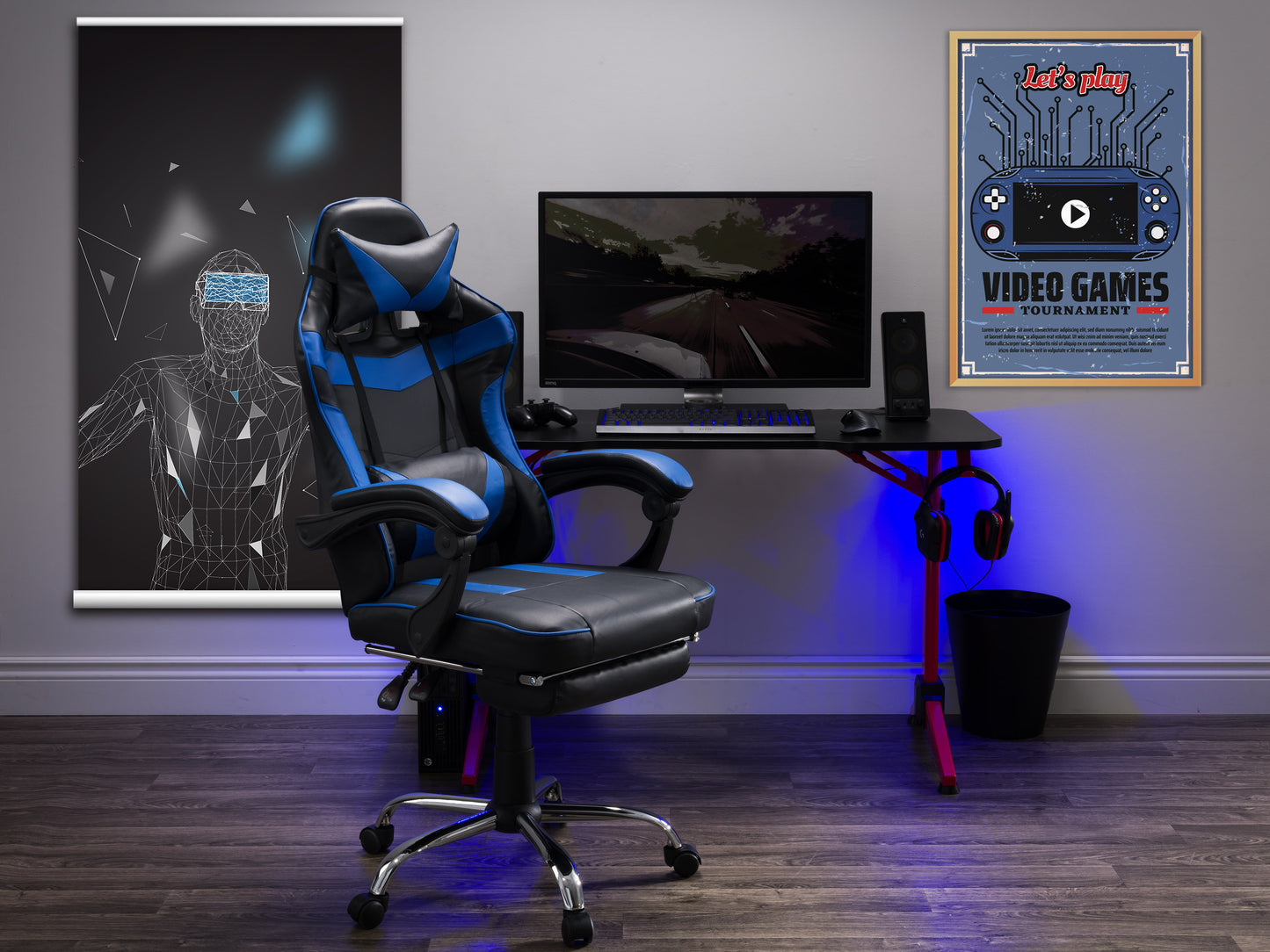 Black and red gaming chair with ergonomic design, adjustable footrest, high backrest, and padded armrests; features breathable leather material and lumbar support for ultimate comfort and style.