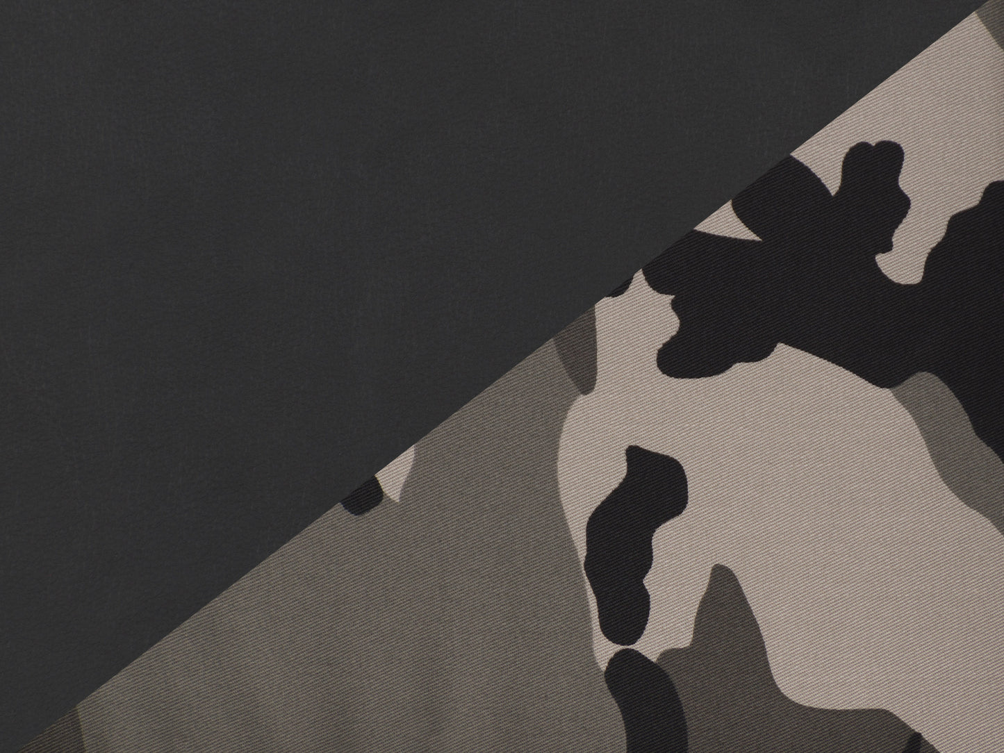 Black and red ergonomic gaming chair with adjustable footrest, high backrest, padded armrests, and lumbar support. Racing-style design with breathable mesh fabric and smooth-rolling casters.